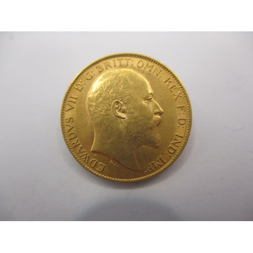 123 - An Edward VII gold half sovereign dated 1910, a circulated coin with fine definition of features