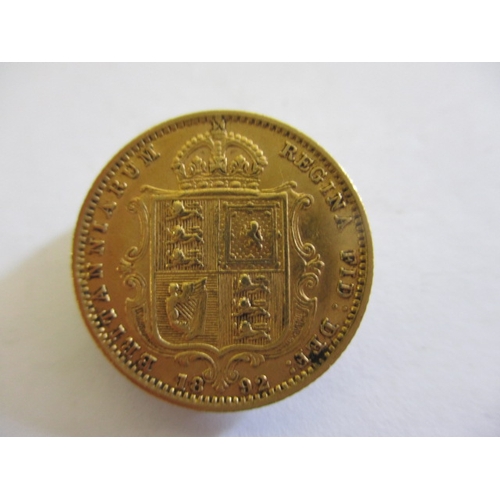 125 - A Victorian gold half sovereign dated 1892,  a circulated coin with fine definition of features