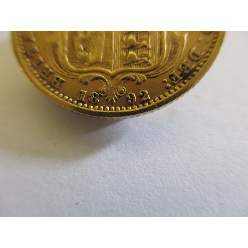 125 - A Victorian gold half sovereign dated 1892,  a circulated coin with fine definition of features