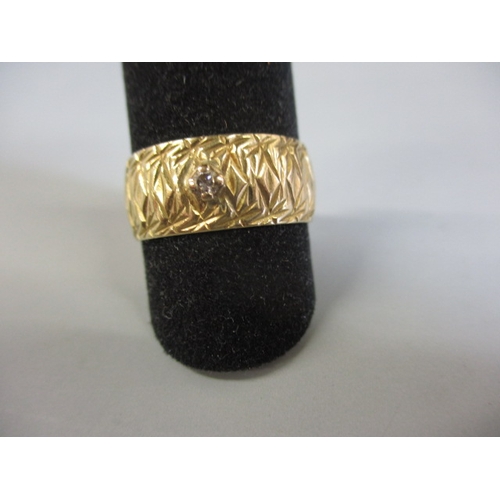 20 - A vintage 18ct yellow gold wedding band with small diamond, approx. ring size ‘N+’, approx. width 7.... 