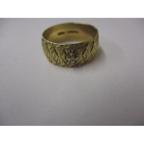 20 - A vintage 18ct yellow gold wedding band with small diamond, approx. ring size ‘N+’, approx. width 7.... 