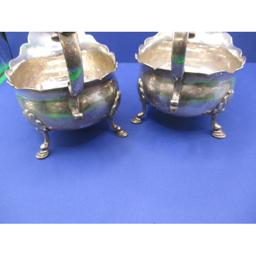 183 - A pair of antique sterling silver sauce boats, both with some minor denting, approx. gross parcel we... 