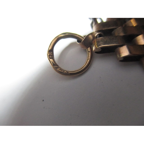 66 - A vintage 9ct yellow gold gate bracelet, in used condition with working clasp and safety chain, appr... 