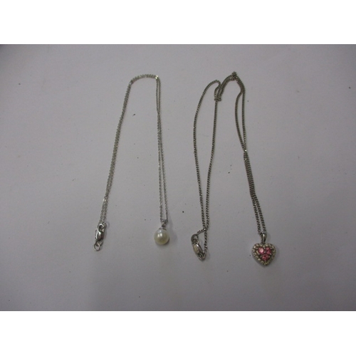 67 - An 18ct white gold necklace with heart shape pendant and a 9ct example, both in good used condition,... 