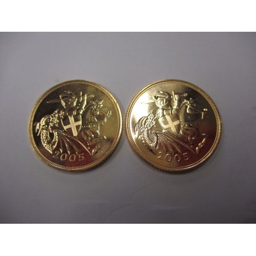 129 - Two Elizabeth II Gold sovereigns, both dated 2005 with the revised Georgge and the Dragon design by ... 