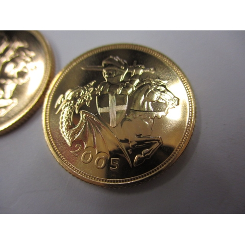 129 - Two Elizabeth II Gold sovereigns, both dated 2005 with the revised Georgge and the Dragon design by ... 