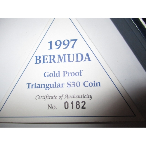 130 - A 1997 Bermuda proof gold $30 triangular coin, approx. weight 15.16g of .999 fine gold, in original ... 