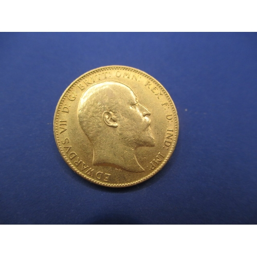 131 - An Edward VII gold sovereign dated 1910, a circulated coin with fine definition of features