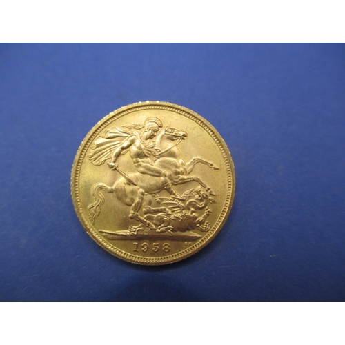 133 - A Elizabeth II gold sovereign dated 1958, a circulated coin with fine definition of features