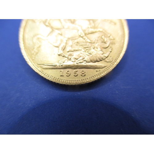 133 - A Elizabeth II gold sovereign dated 1958, a circulated coin with fine definition of features