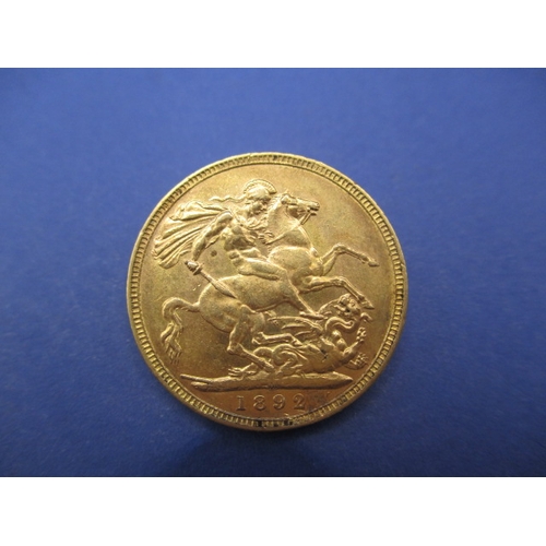 134 - A Victorian gold sovereign dated 1892, a circulated coin with fine definition of features