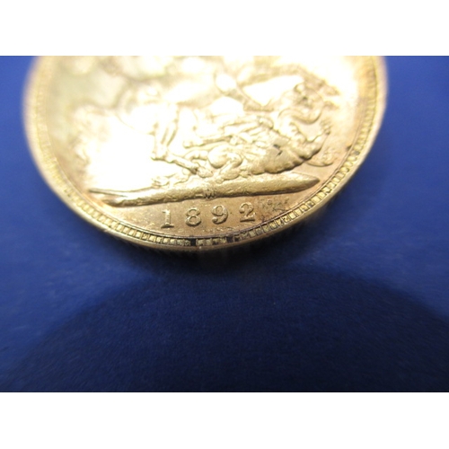 134 - A Victorian gold sovereign dated 1892, a circulated coin with fine definition of features