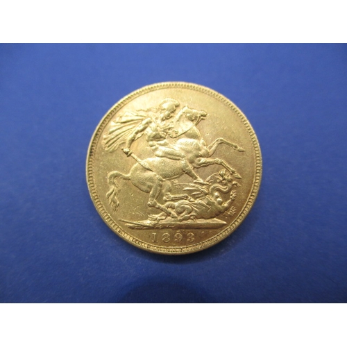 135 - A Victorian gold sovereign dated 1893, a circulated coin with fine definition of features