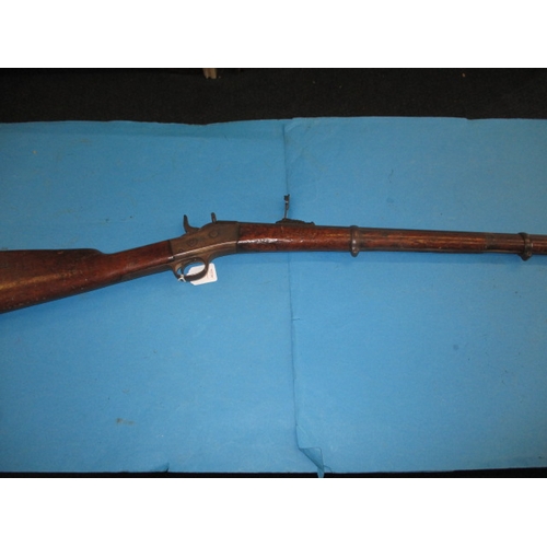 255 - An antique Remington rolling block breech rifle, approx. length 128cm, having general use related ma... 