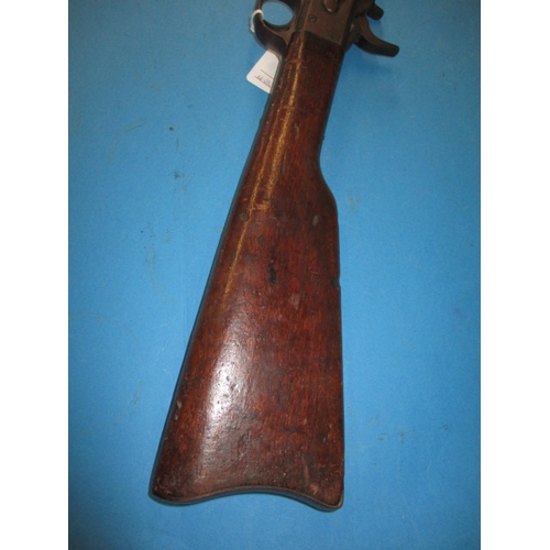 255 - An antique Remington rolling block breech rifle, approx. length 128cm, having general use related ma... 