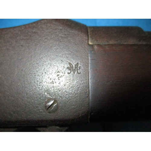 257 - An antique Martini Henry rifle, approx. length 104cm having general use related marks