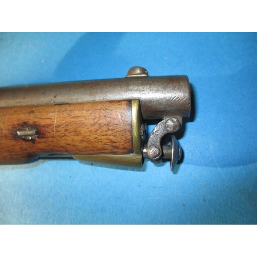 262 - An E.I.G. cavalry percussion pistol marked Birmingham 1867, repaired stock, functioning hammer and g... 