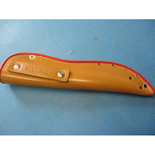 266 - A Puma sea hunter fishing knife, model 6363, serial number 41272, with original leather scabbard, in... 