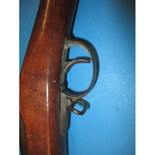 258 - An antique hammer rifle with trap door breech, approx. length 135cm pre-owned with use-related marks