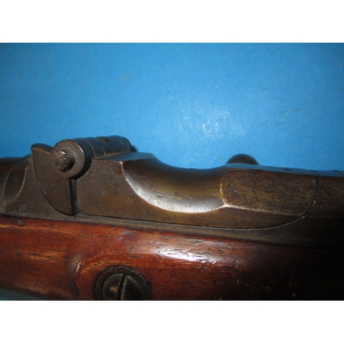 258 - An antique hammer rifle with trap door breech, approx. length 135cm pre-owned with use-related marks