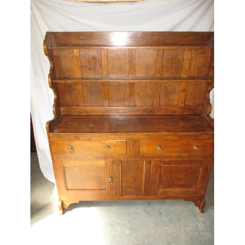 327 - A vintage oak dresser with top rack, in good useable pre-owned condition, approx. dimensions H 154cm... 