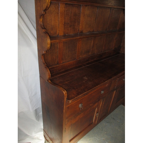 327 - A vintage oak dresser with top rack, in good useable pre-owned condition, approx. dimensions H 154cm... 