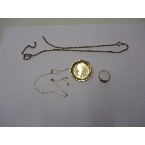 88 - A parcel of scrap gold, an 18ct watch back 5.4g, 2x 9ct necklaces 5.3g and a 15ct ring shank 1.4g