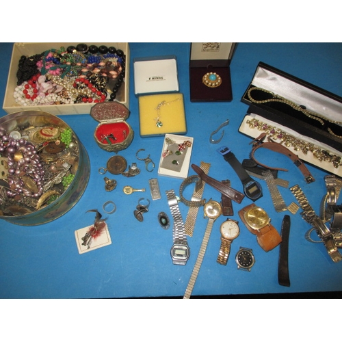 219 - A parcel of vintage costume jewellery and watches, to include some silver items, all in used conditi... 