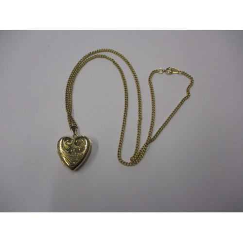 73 - A 9ct yellow gold necklace with heart shape locket pendant, approx. linear length of chain 50cm, app... 