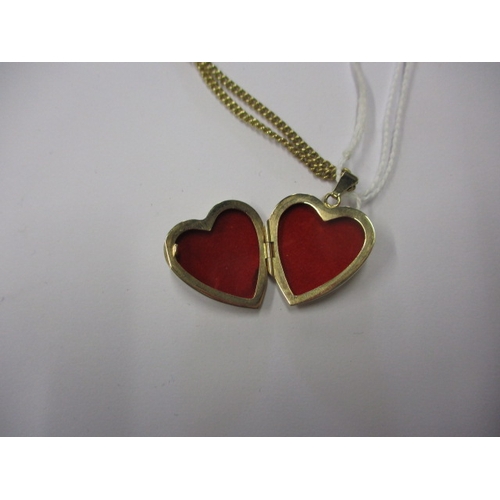 73 - A 9ct yellow gold necklace with heart shape locket pendant, approx. linear length of chain 50cm, app... 