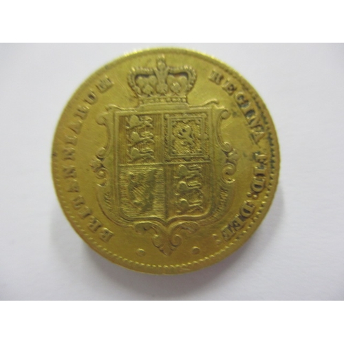 137 - A Victorian gold half sovereign dated 1853, a circulated coin with fine definition of features with ... 