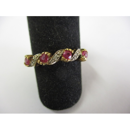 6 - A vintage 9ct gold diamond and ruby dress ring, approx. ring size L+, approx. weight 2g in useable p... 