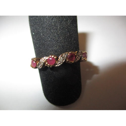 6 - A vintage 9ct gold diamond and ruby dress ring, approx. ring size L+, approx. weight 2g in useable p... 