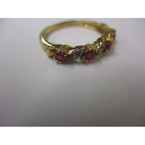 6 - A vintage 9ct gold diamond and ruby dress ring, approx. ring size L+, approx. weight 2g in useable p... 