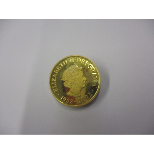 138 - A 2002 gold jubilee collectors coin, in uncirculated condition, approx. weight 7g