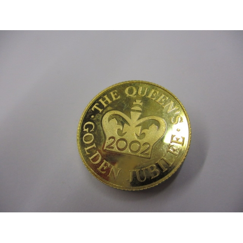 139 - A 2002 gold jubilee collectors coin, in uncirculated condition, approx. weight 7g