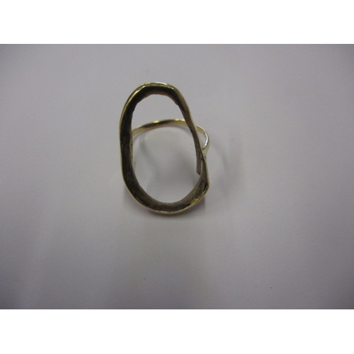 57 - A gold ring shank, damaged so sold as scrap, approx. weight 3.7g