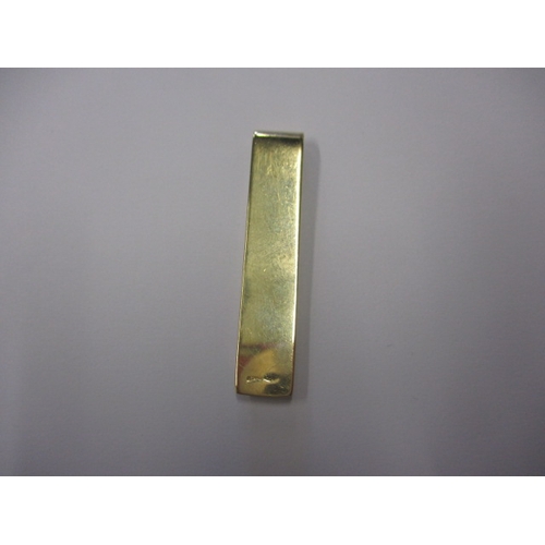 74 - A 750 yellow gold money clip, in good pre-owned condition, approx. weight 8.95g