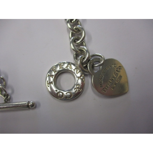 209 - A genuine Tiffany & Co 925 silver bracelet, with bag, provenance by vendor as purchased from the New... 