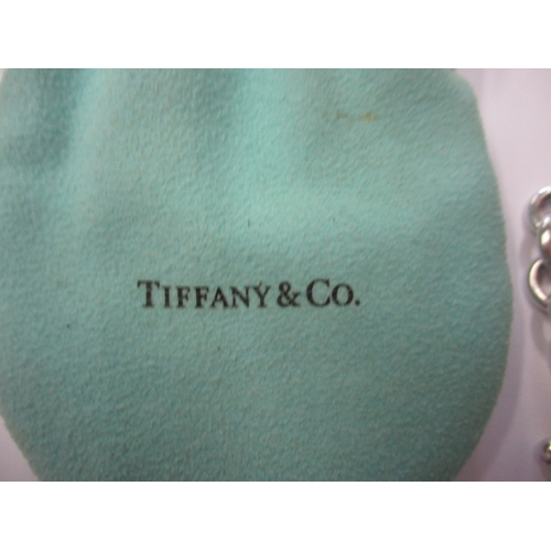 209 - A genuine Tiffany & Co 925 silver bracelet, with bag, provenance by vendor as purchased from the New... 