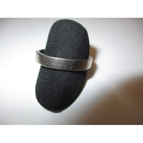 58 - A large gents ring marked 750 with Birmingham mark, approx. ring, size X+ approx. weight 7.5g, in us... 