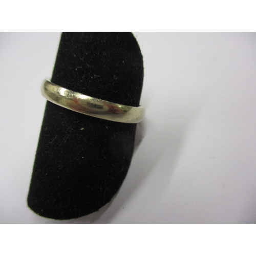 59 - A vintage 750 gold wedding band, approx. width 3mm, approx. ring size O+, approx. weight 3.5g, in us... 