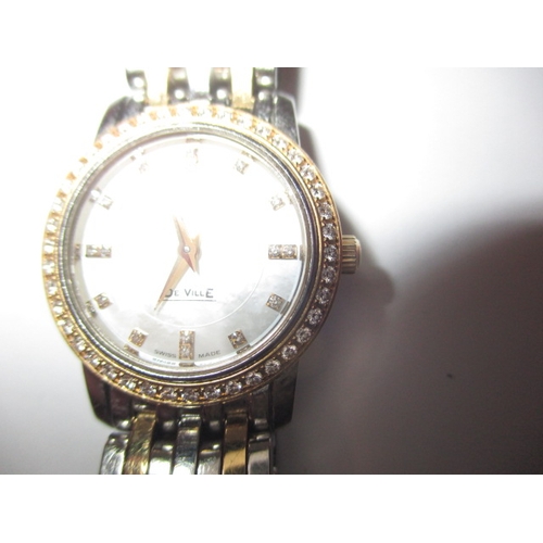 100 - A ladies Omega 1456 wrist watch, having diamond set bezel, in working order with box and all paperwo... 