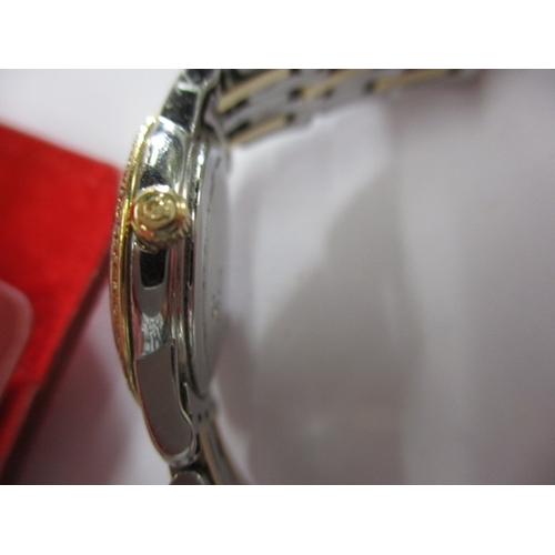 100 - A ladies Omega 1456 wrist watch, having diamond set bezel, in working order with box and all paperwo... 