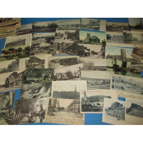 285 - A parcel of Edwardian and later postcards, most topographical with some local views, all in used con... 