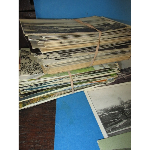 285 - A parcel of Edwardian and later postcards, most topographical with some local views, all in used con... 