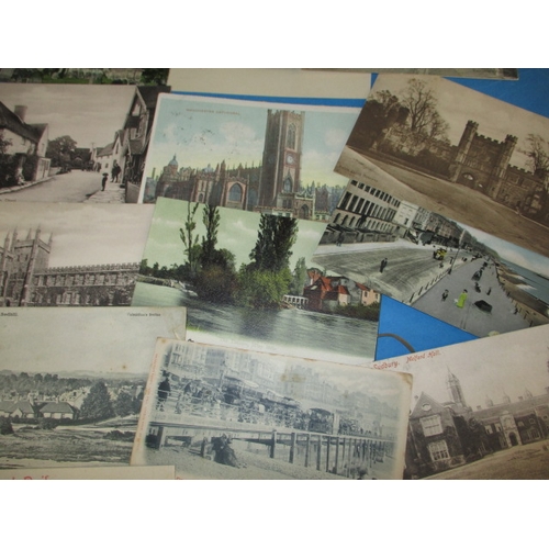 285 - A parcel of Edwardian and later postcards, most topographical with some local views, all in used con... 