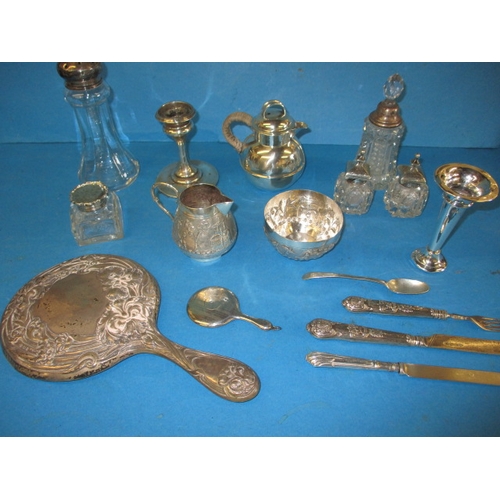 203 - A parcel of silver and white metal items, all in used condition with some denting