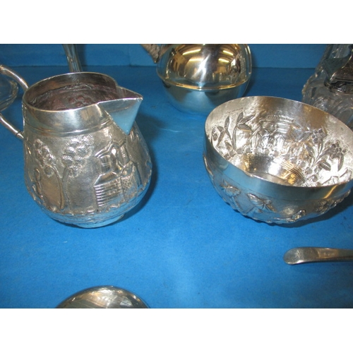 203 - A parcel of silver and white metal items, all in used condition with some denting