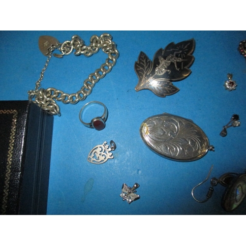 221 - A large quantity of vintage costume jewellery, to include some silver items and a gold pendant and a... 